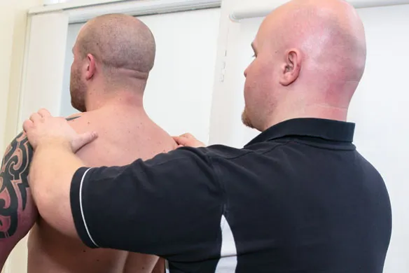 Phil performing chiropractic care